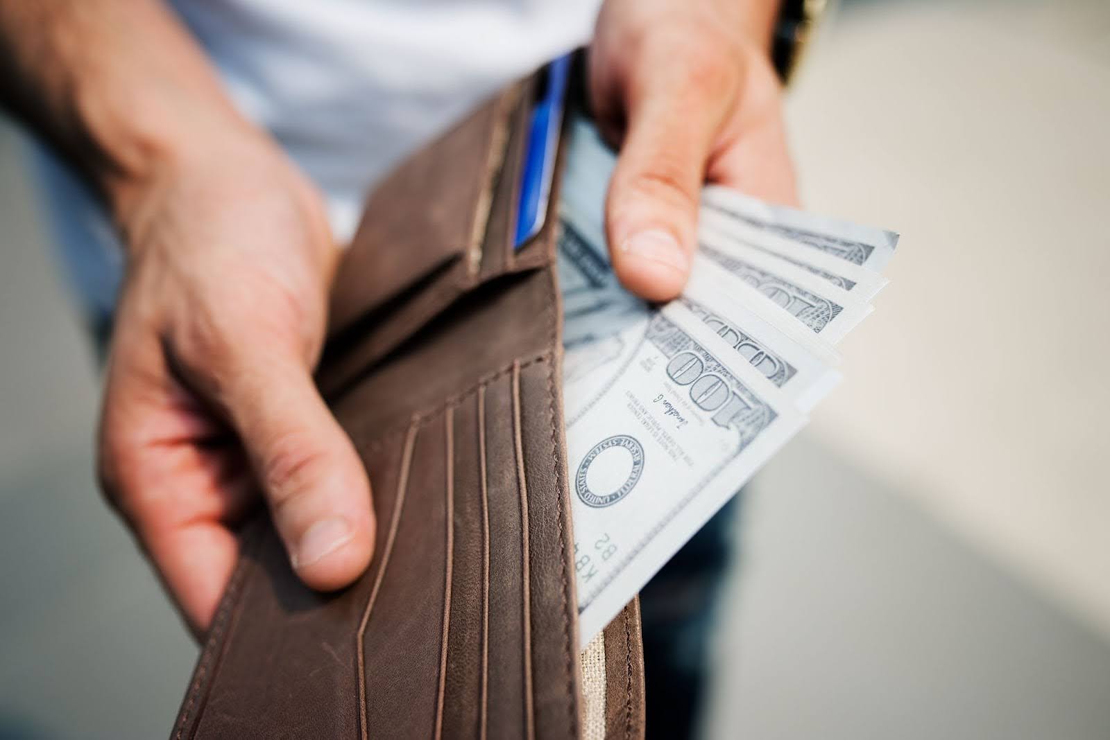 Open wallet with banknotes in it